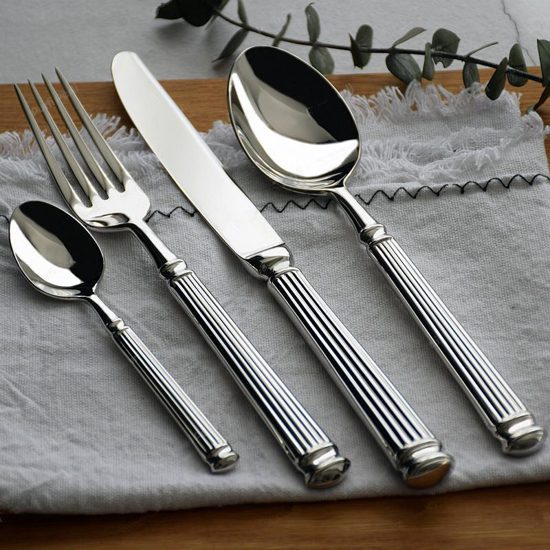 4-piece Silver Cutlery Set with a Ribbed Handle