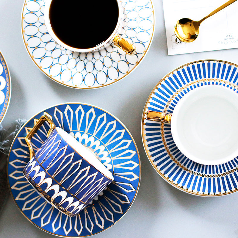 Patterned Tea Cup Set with Golden Handles and Saucer