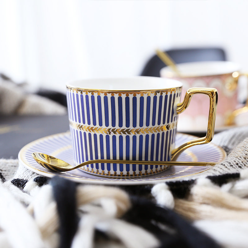 Patterned Tea Cup Set with Golden Handles and Saucer