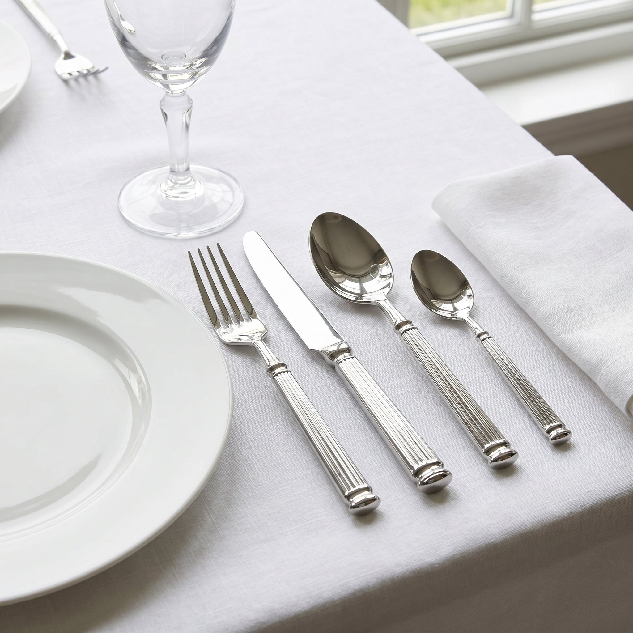 4-piece Silver Cutlery Set with a Ribbed Handle